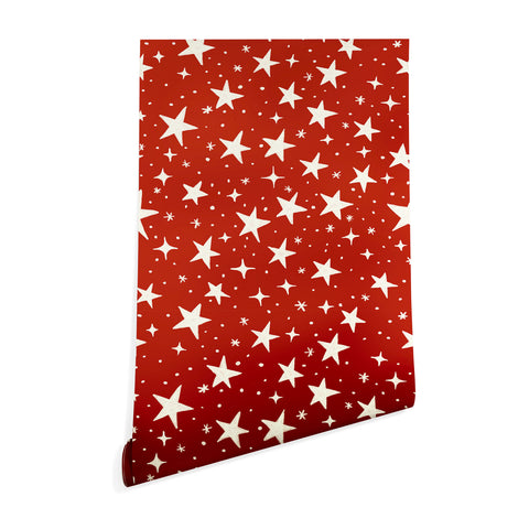 Avenie Christmas Stars in Red Wallpaper