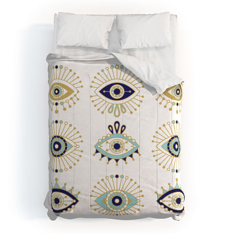 Cat Coquillette Evil Eye Collection on White Comforter
