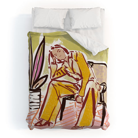 DESIGN d´annick Woman sitting on sofa Duvet Cover