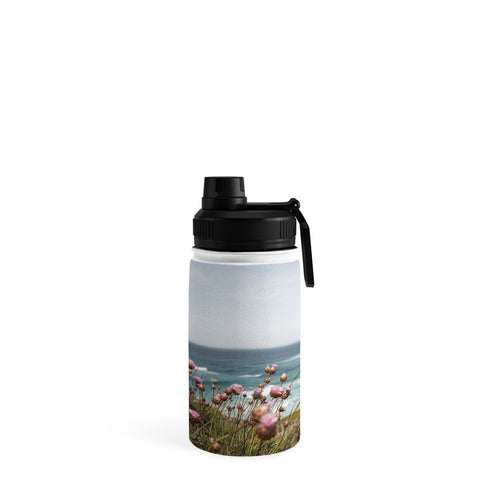 Henrike Schenk - Travel Photography Pink Flowers by the Ocean Water Bottle