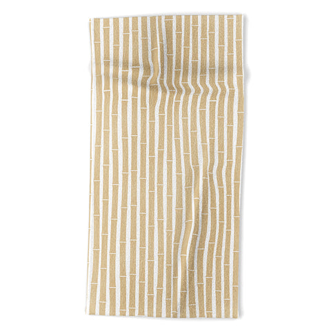 Little Arrow Design Co bamboo tiki gold Beach Towel