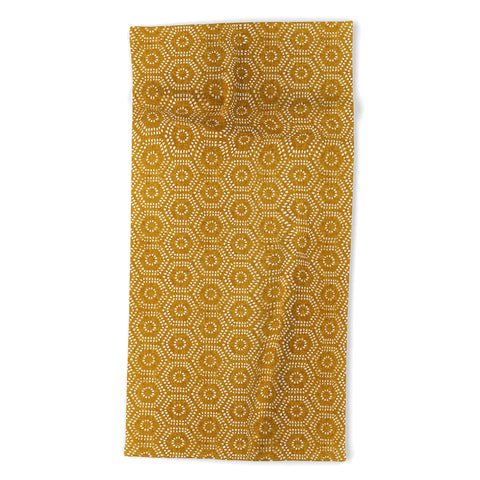 Little Arrow Design Co boho hexagons gold Beach Towel