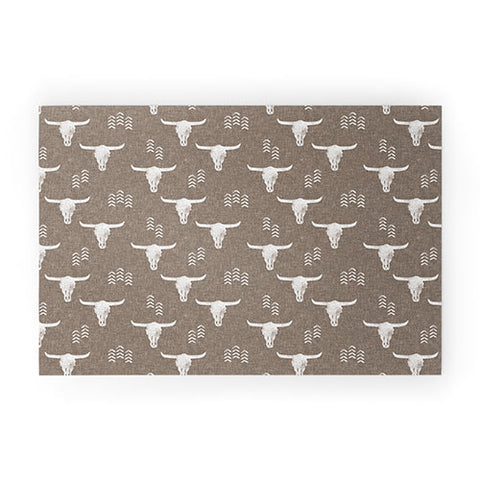 Little Arrow Design Co cow skulls on taupe Welcome Mat