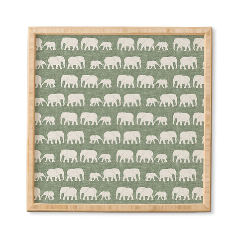 Little Arrow Design Co elephants marching sage Framed Wall Art