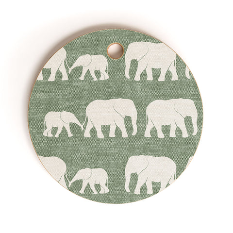Little Arrow Design Co elephants marching sage Cutting Board Round
