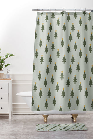 Little Arrow Design Co simple xmas trees on sage Shower Curtain And Mat