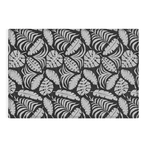 Little Arrow Design Co tropical leaves charcoal Outdoor Rug