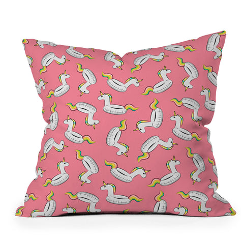 Little Arrow Design Co unicorn pool float on pink Outdoor Throw Pillow