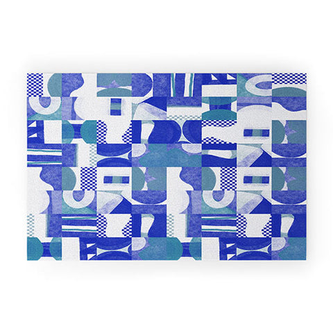 Little Dean Geometrical collage in blue shades Welcome Mat