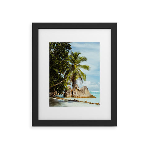 Pita Studios Palm tree bending over the sea Framed Art Print