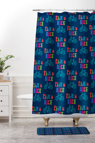 Andi Bird Ride A Bike Sketchy Navy Shower Curtain And Mat