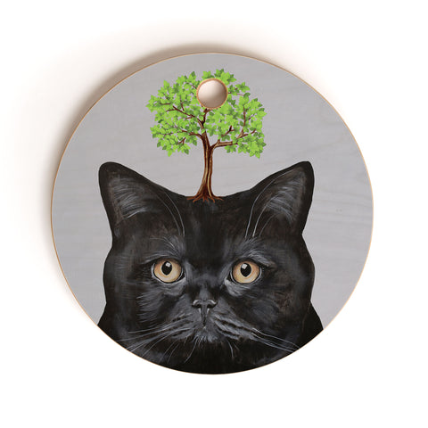Coco de Paris A black cat with a tree Cutting Board Round