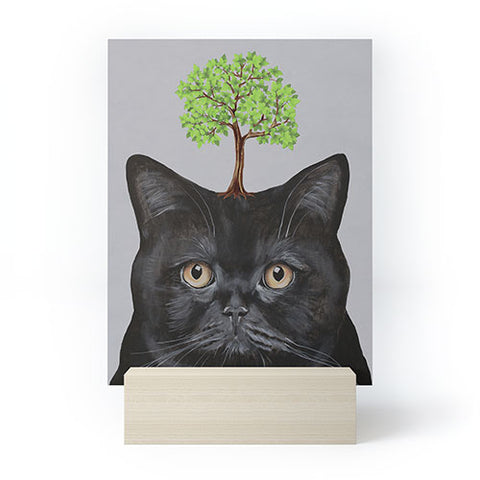 Coco de Paris A black cat with a tree Mini Art Print