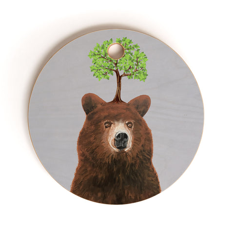 Coco de Paris A brown bear with a tree Cutting Board Round