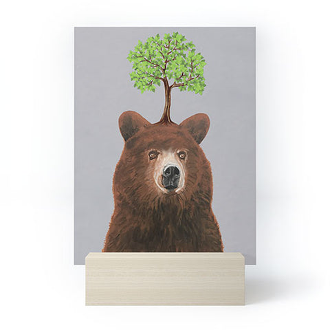 Coco de Paris A brown bear with a tree Mini Art Print