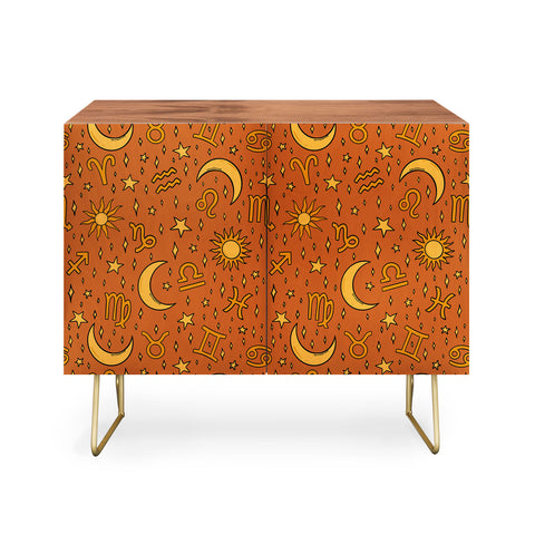 Doodle By Meg Zodiac Sun and Star Print Rust Credenza