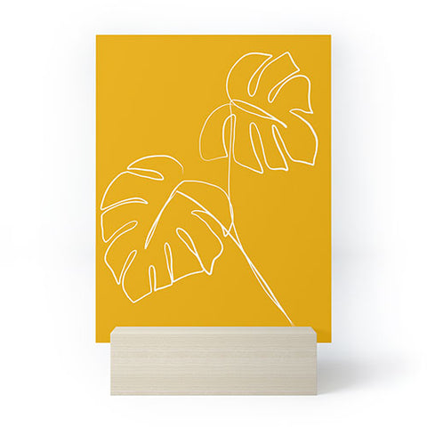 Gale Switzer Monstera minimal yellow Mini Art Print