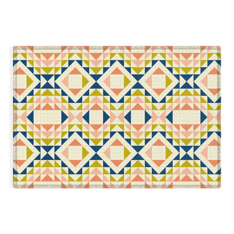Jenean Morrison Top Stitched Quilt Coral Outdoor Rug