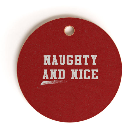 Leah Flores Naughty and Nice Cutting Board Round