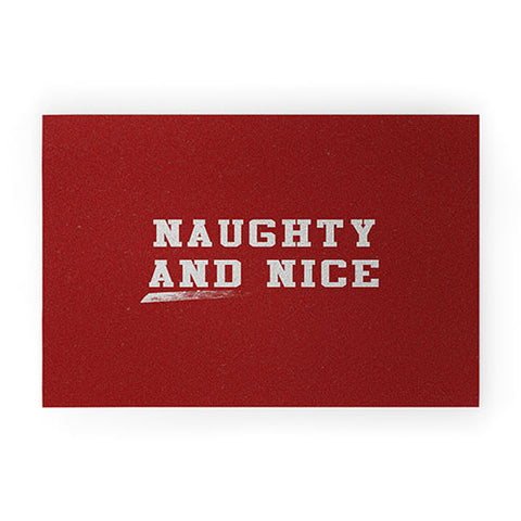 Leah Flores Naughty and Nice Welcome Mat