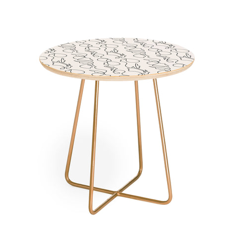 Little Arrow Design Co aria flowing faces Round Side Table