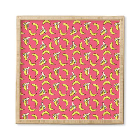 Little Arrow Design Co Bananas on Pink Framed Wall Art