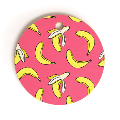 Little Arrow Design Co Bananas on Pink Cutting Board Round