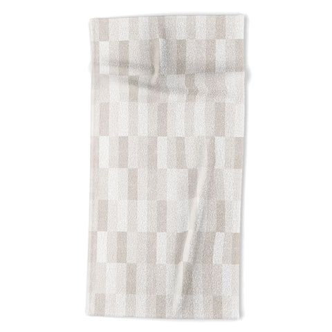 Little Arrow Design Co cosmo tile khaki Beach Towel