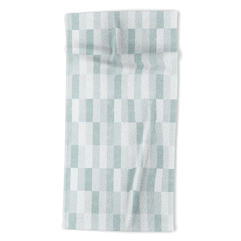 Little Arrow Design Co cosmo tile teal Beach Towel