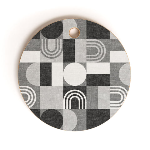 Little Arrow Design Co geometric patchwork gray Cutting Board Round