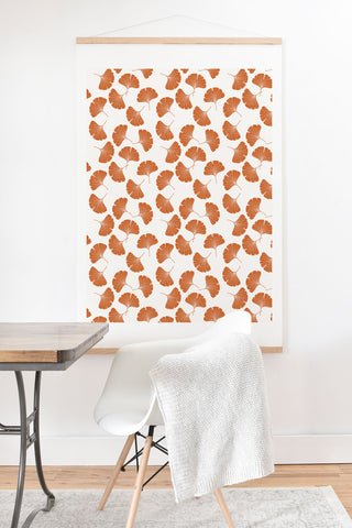 Little Arrow Design Co orange ginkgo leaves Art Print And Hanger