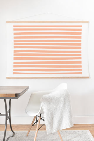 Little Arrow Design Co unicorn dreams stripes in peach Art Print And Hanger
