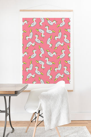 Little Arrow Design Co unicorn pool float on pink Art Print And Hanger
