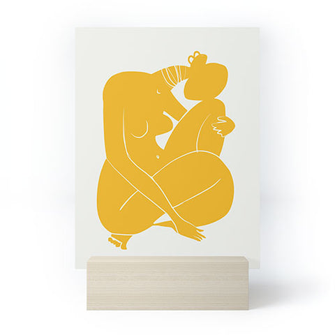 Little Dean Baby hug nude in yellow Mini Art Print