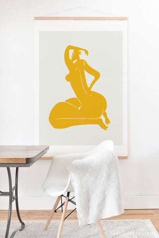 Little Dean Curvy nude in yellow Art Print And Hanger