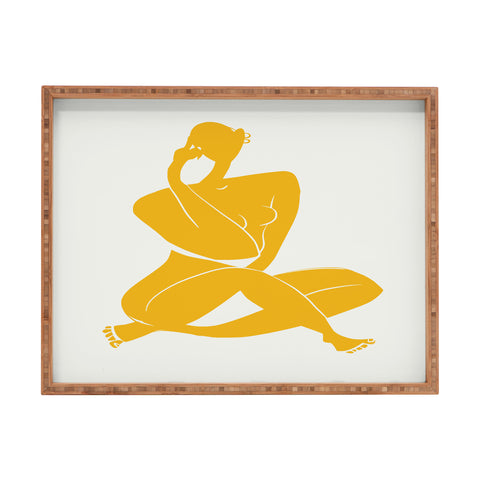Little Dean Nude sitting in yellow Rectangular Tray