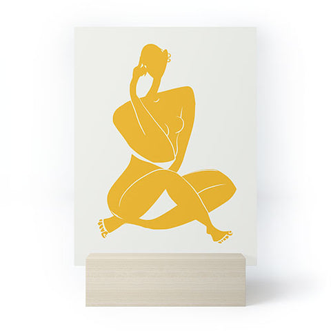 Little Dean Nude sitting in yellow Mini Art Print