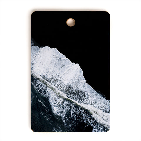 Michael Schauer Waves crashing on a black sand beach Cutting Board Rectangle