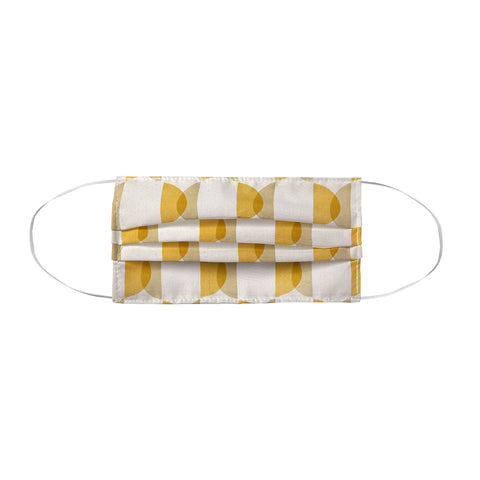 Modern Tropical Shape Study in Gold Geometric Face Mask