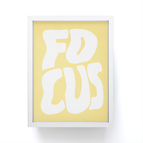 Phirst Focus yellow and white Framed Mini Art Print