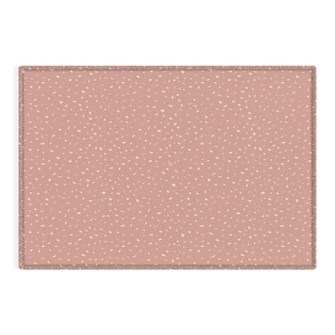 Sewzinski Cream Dots on Rose Pink Outdoor Rug