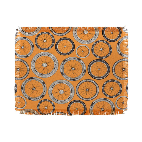 Sharon Turner bike wheels amber Throw Blanket