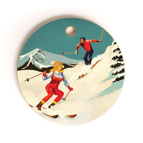 The Whiskey Ginger Retro Skiing Couple Cutting Board Round