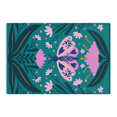 Angela Minca Folk Art Moth Pink Teal Outdoor Rug