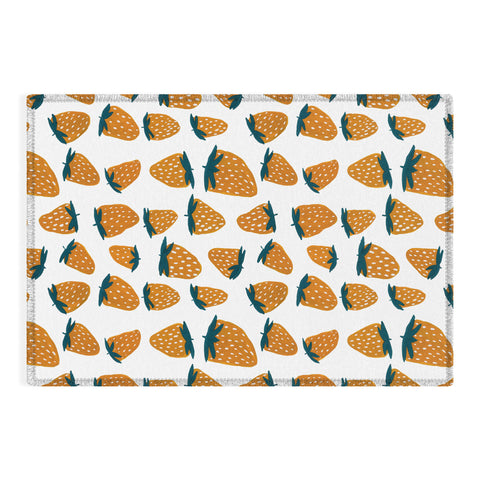 Angela Minca Organic orange strawberries Outdoor Rug