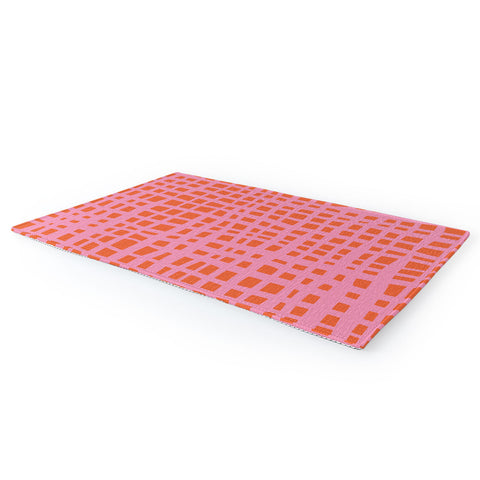 Angela Minca Retro grid orange and pink Area Rug