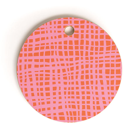 Angela Minca Retro grid orange and pink Cutting Board Round