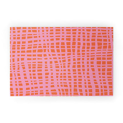 Angela Minca Retro grid orange and pink Welcome Mat