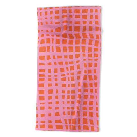 Angela Minca Retro grid orange and pink Beach Towel