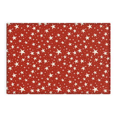 Avenie Christmas Stars in Red Outdoor Rug